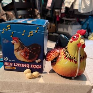 Vintage Tin Hen Laying Eggs Toy - Yellow Red